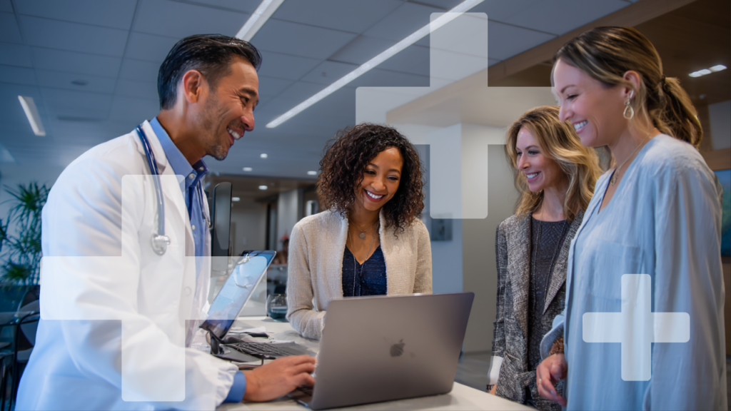 A doctor meeting with staff to discuss information - Sopra Health HCP 01
