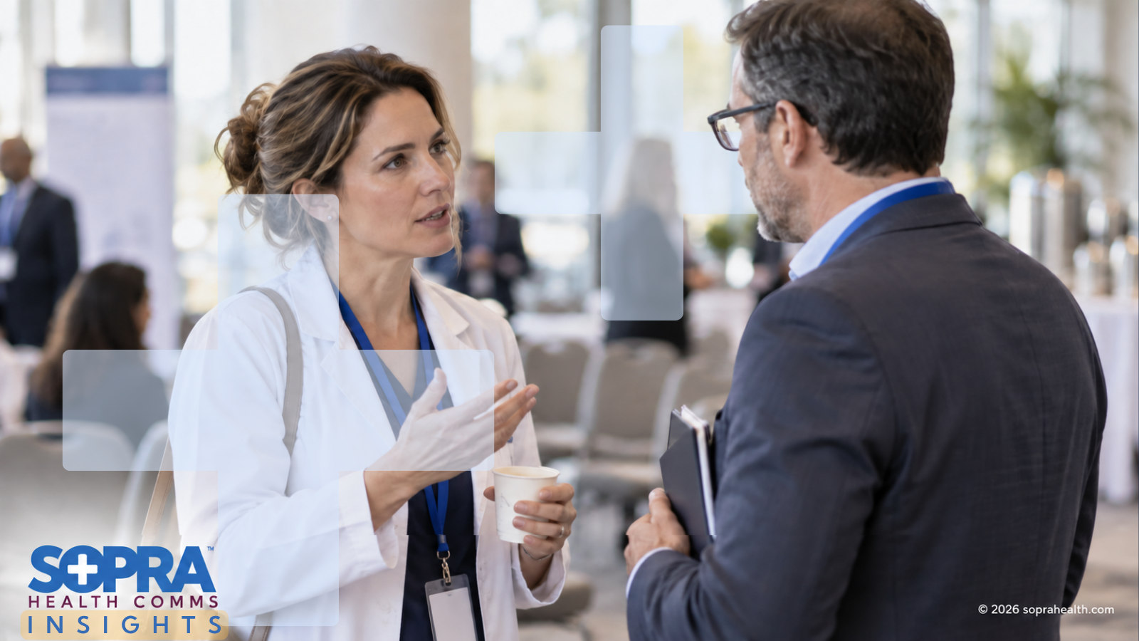A practitioner having a conversation with a business person - 105 hero sopra health insights